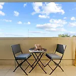 Top Floor Apartment With Balcony In Great Location