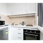 Bright, Modern Studio Steps From The Action