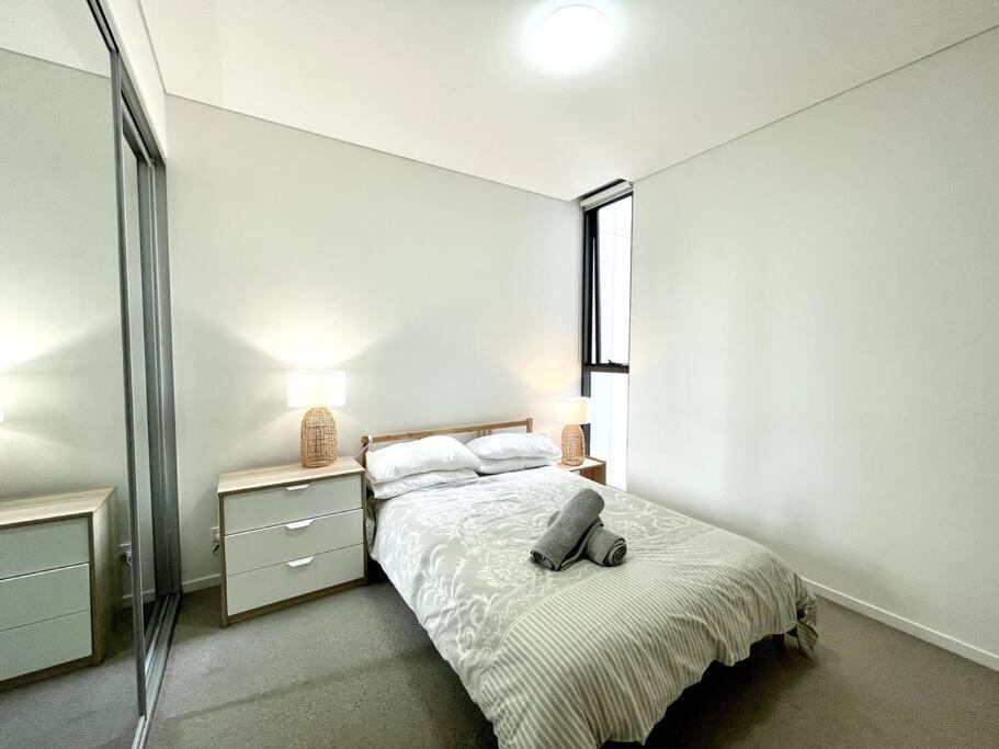 High Floor Skyline View 2br Close2olympic Park Apartment Sydney